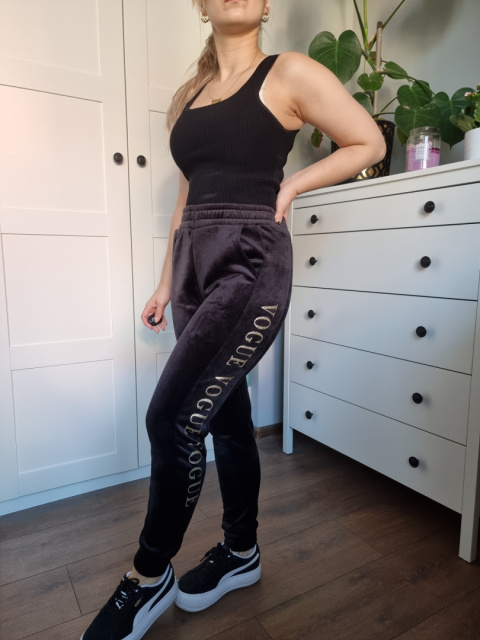Black velour sweatpants with gold lettering Black velour sweatpants with gold lettering