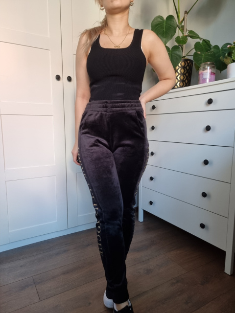 Black velour sweatpants with gold lettering Black velour sweatpants with gold lettering