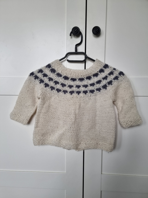 Children's sweater in Scandinavian style, handmade from wool. Children's sweater in Scandinavian style, handmade from wool.