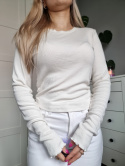 Cream blouse with ruffle on the side