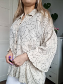 Beige shirt with a ruffle with patterns, size L